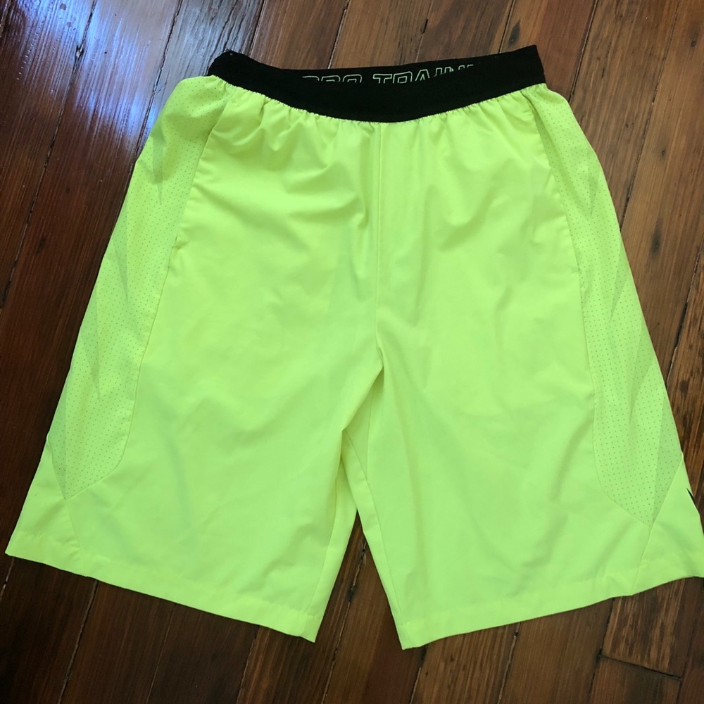 Nike bright yellow men’s athletic shorts